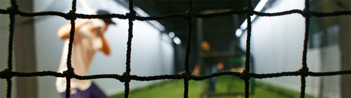Man in batting cage